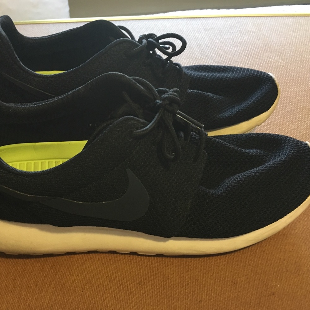 Black Nike sneakers in Great condition .